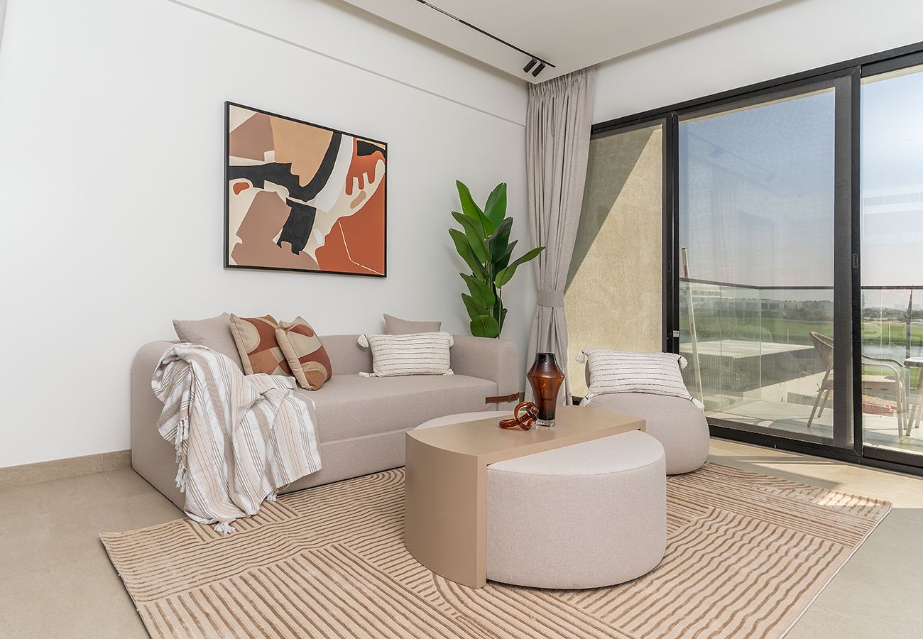 Apartment in Ajman - Luxury 3BR with Golf & Lake Views