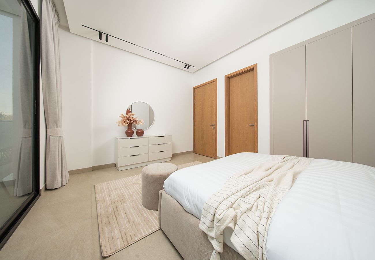 Apartment in Ajman - Luxury 3BR with Golf & Lake Views