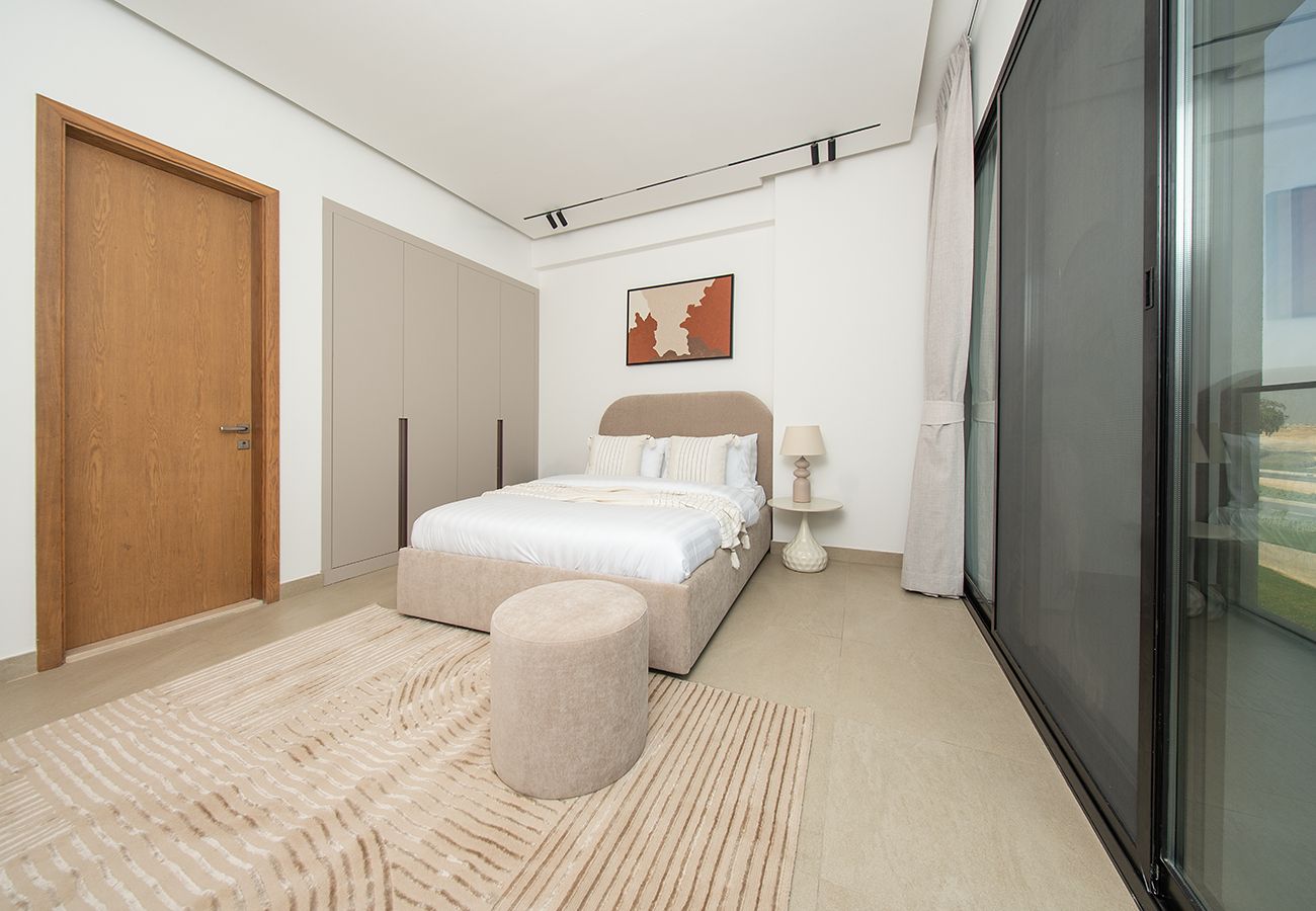 Apartment in Ajman - Luxury 3BR with Golf & Lake Views