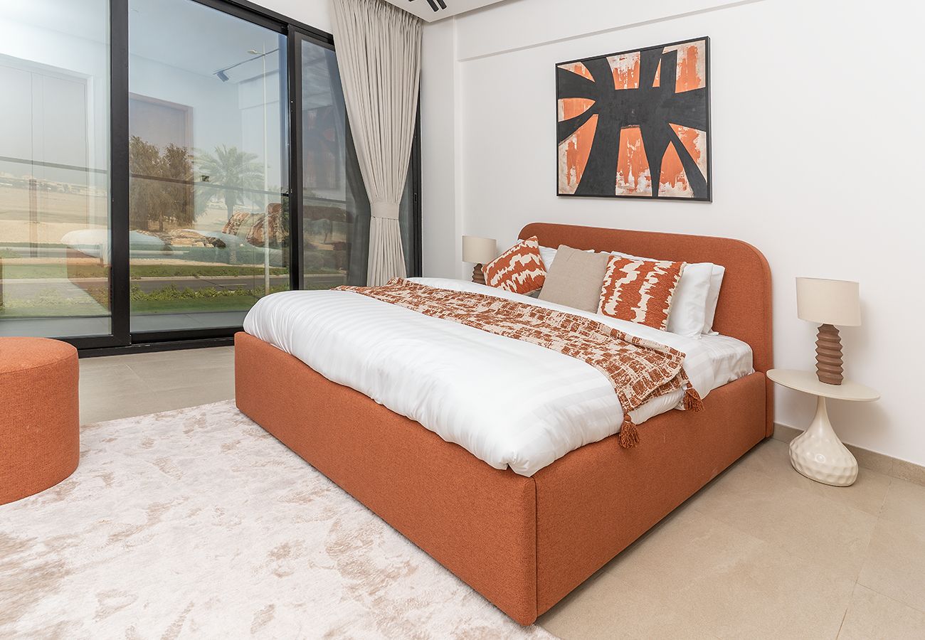 Apartment in Ajman - Luxury 3BR with Golf & Lake Views