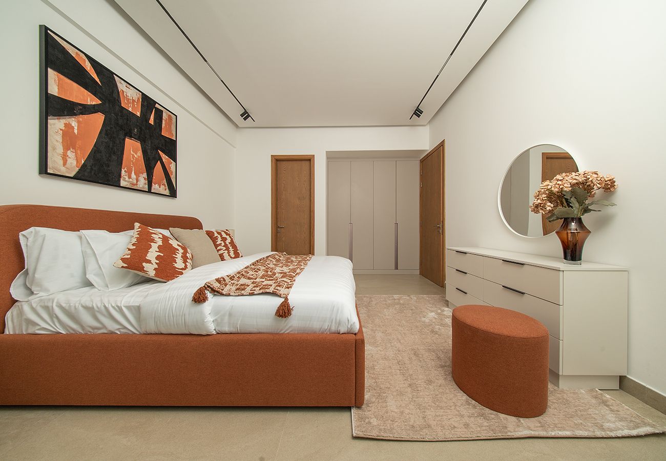 Apartment in Ajman - Luxury 3BR with Golf & Lake Views