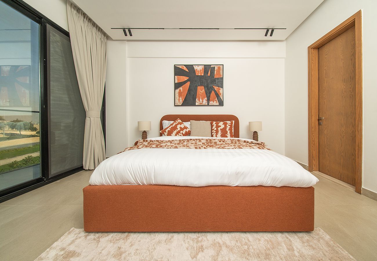 Apartment in Ajman - Luxury 3BR with Golf & Lake Views