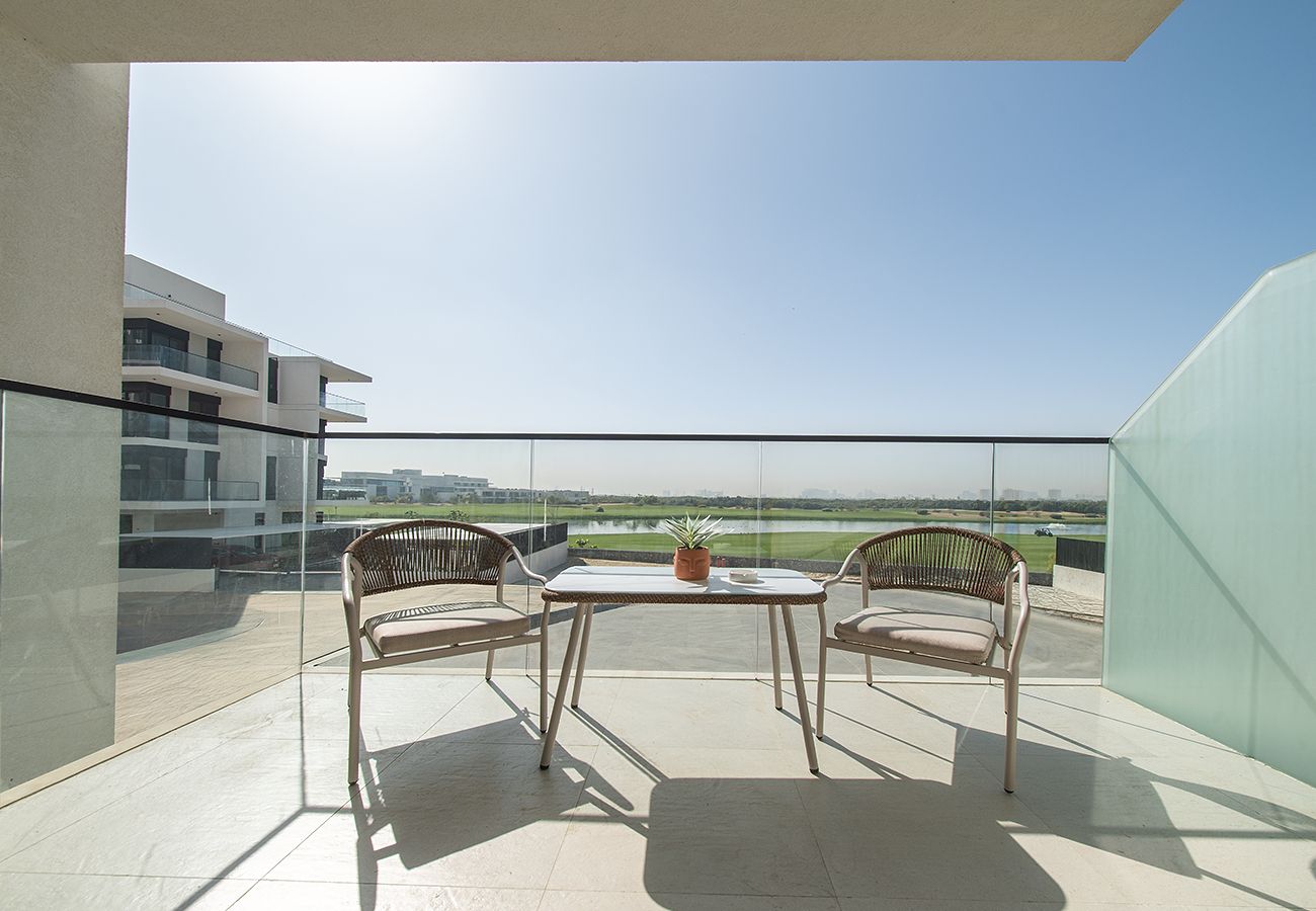 Apartment in Ajman - Luxury 3BR with Golf & Lake Views