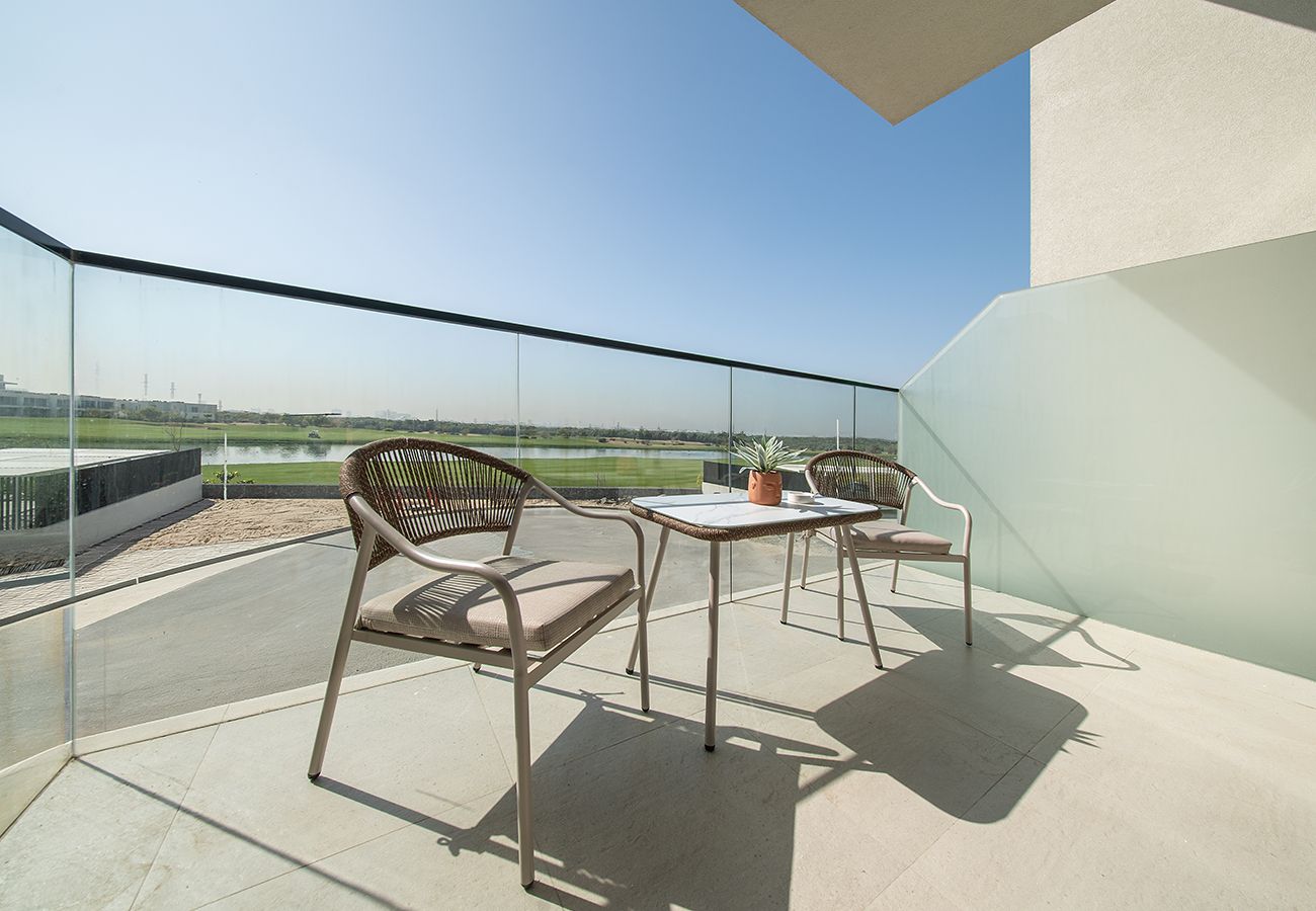 Apartment in Ajman - Luxury 3BR with Golf & Lake Views