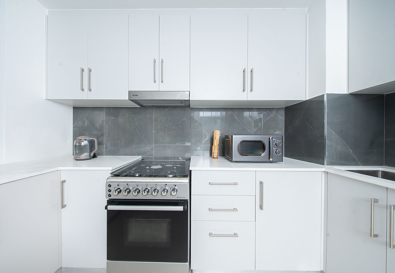 Apartment in Sharjah - Modern 2BR Retreat at Jawaher Residence 1