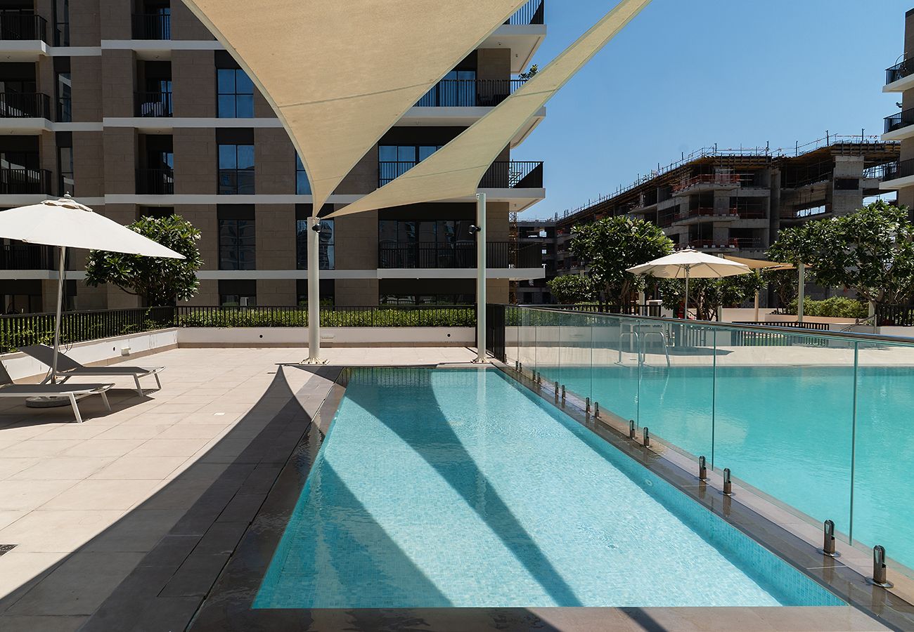 Apartment in Sharjah - Modern 2BR Retreat at Jawaher Residence 1