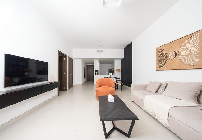 Apartment in Ajmal Makan - Chic 1BR with Balcony & Pool Access